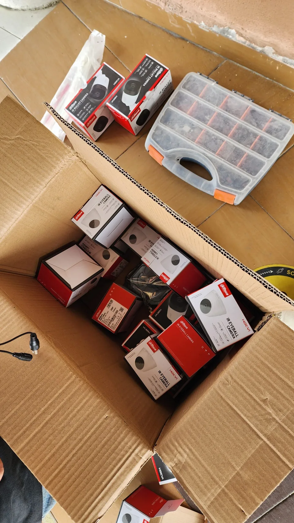 Boxed CCTV cameras and accessories.