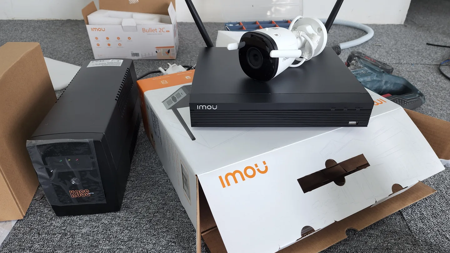 Boxed wireless cameras, recorder, camera, and backup power unit.