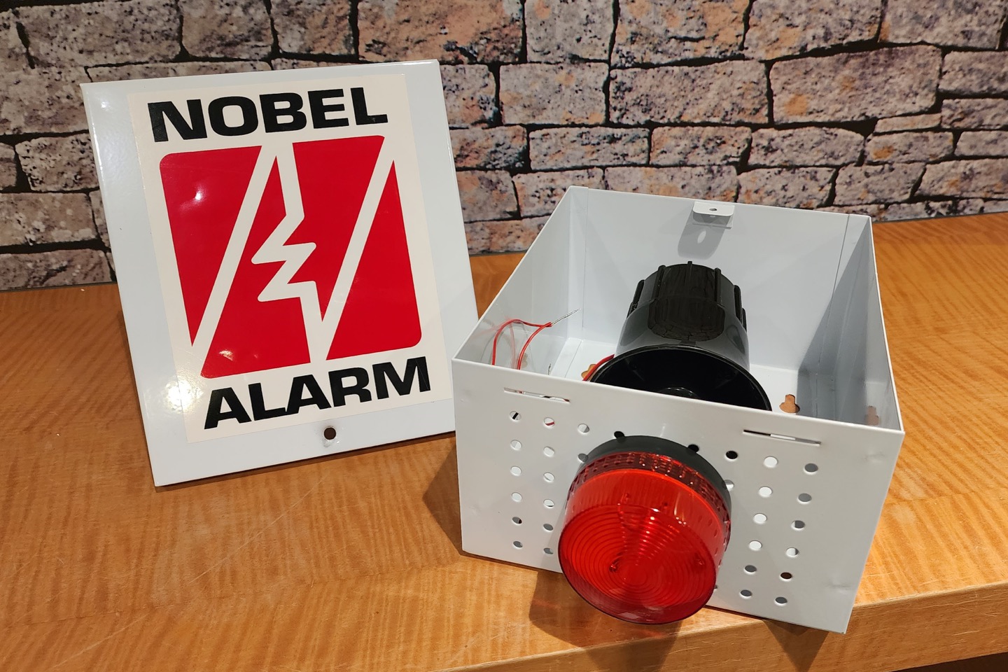 Nobel Alarm branded alarm enclosure and siren